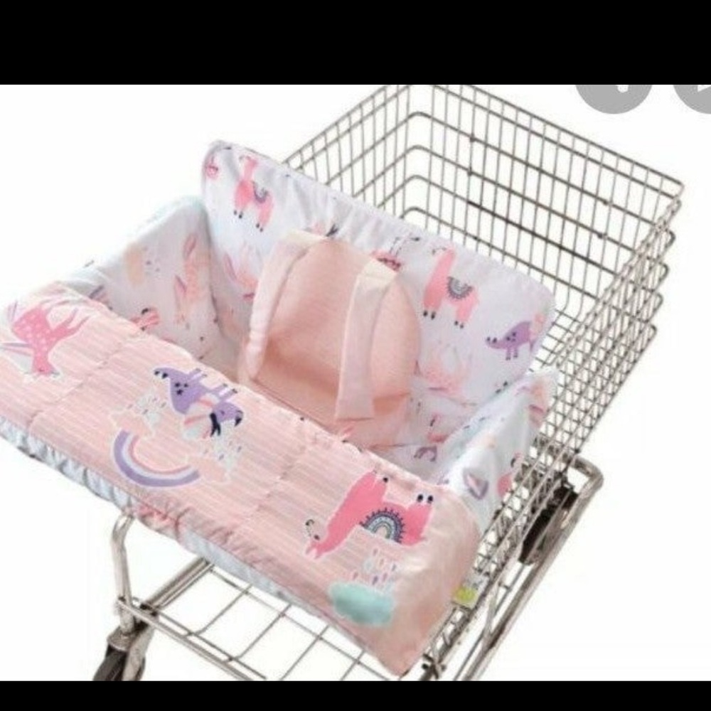 Go by Goldbug pink dinosaur, llama, and rhino shopping cart cover